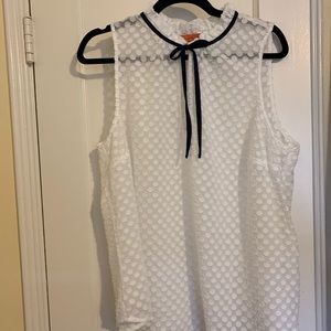 Elegant White Sleeveless Top with Black Trim